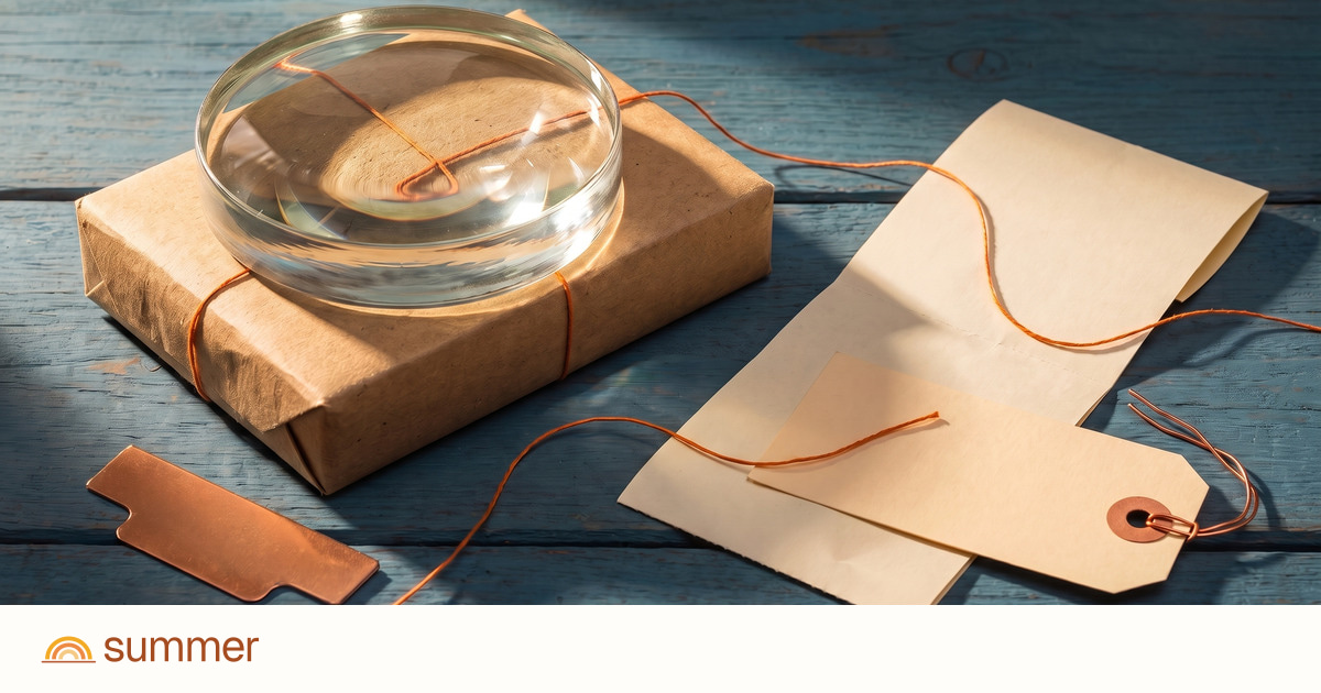 A magnifying lens over a parcel, receipt and carrier tag, illustrating an order-status investigation.